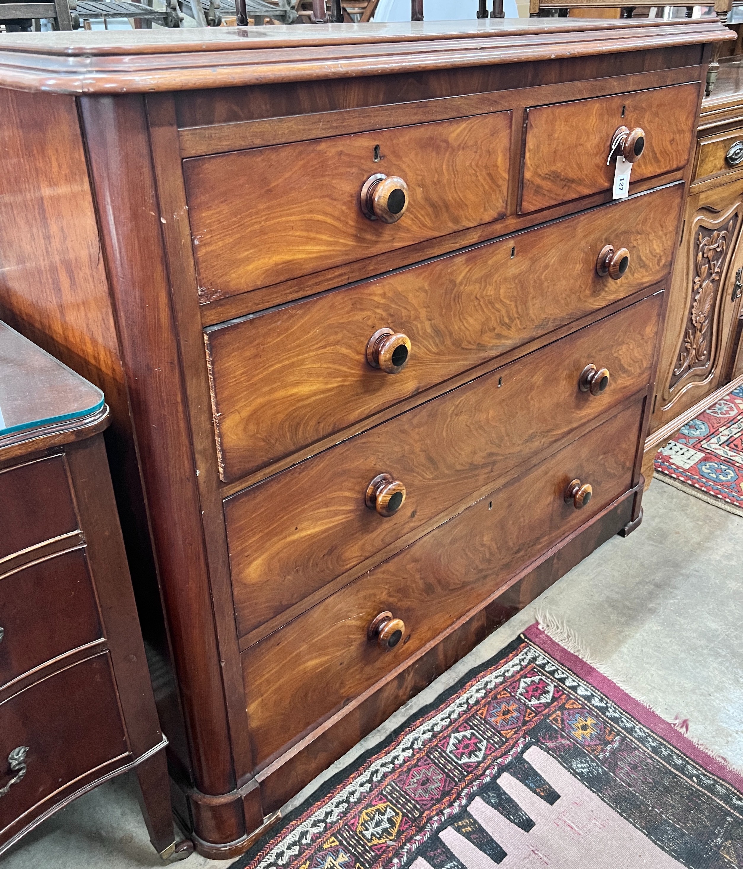 A mahogany chest of drawers, width 130cm, depth 59cm, height 112cm *Please note the sale commences at 9am.